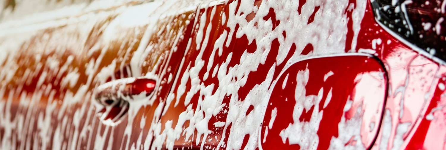 suds running off a red car