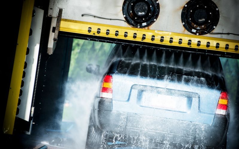 back of a vehicle inside an iba car wash
