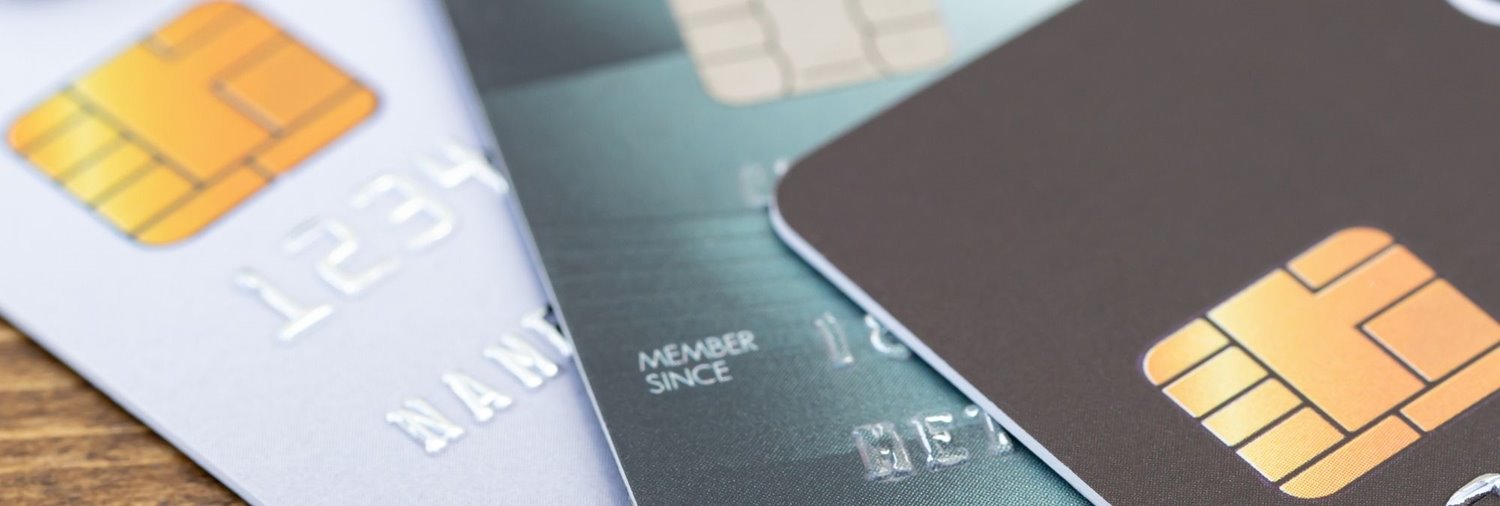 close up of credit cards fanned out on a table