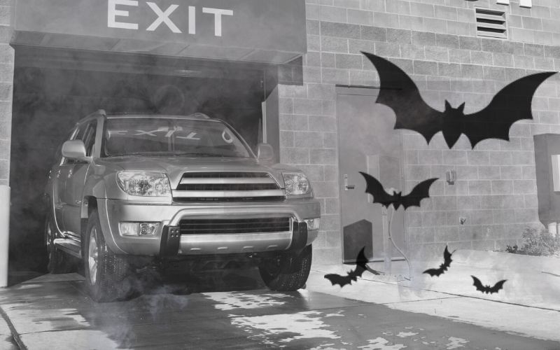 fog and bats in front of a car wash