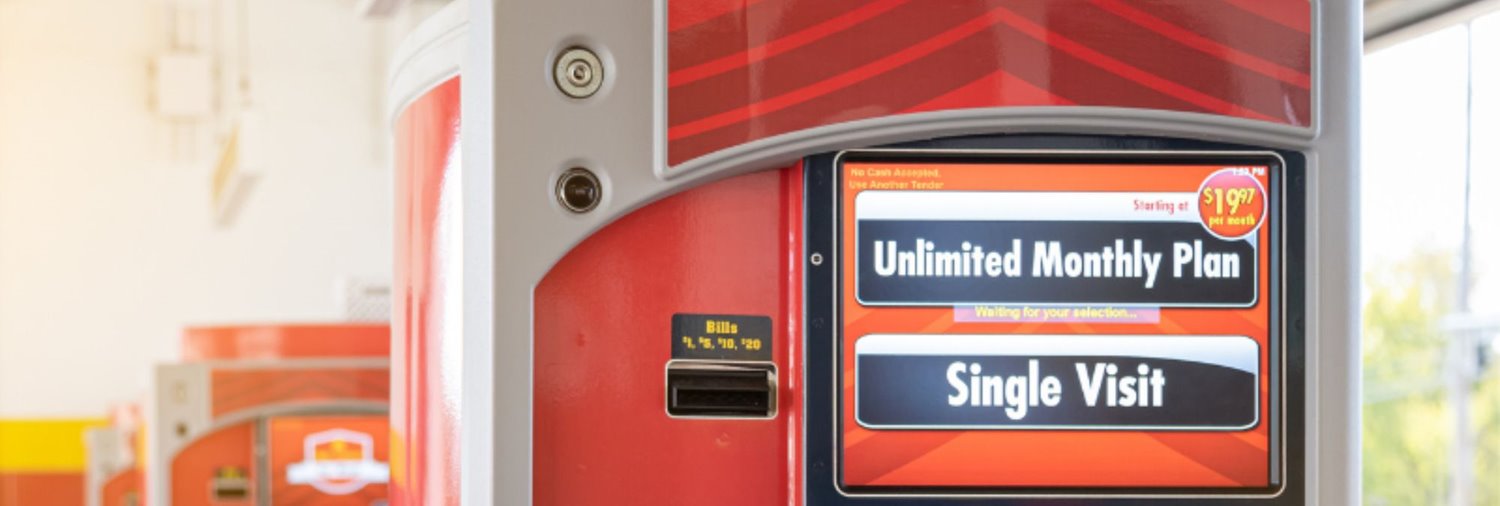 Close up of car wash pay station offering an unlimited wash plan