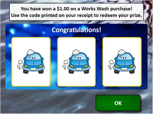 car wash pay station screen showing a spin-to-win game
